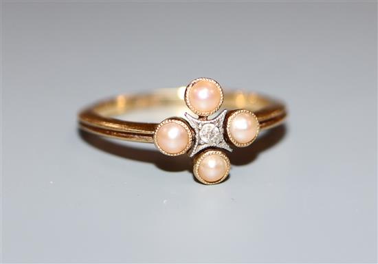 An 18ct, diamond and split pearl cluster ring, size L.